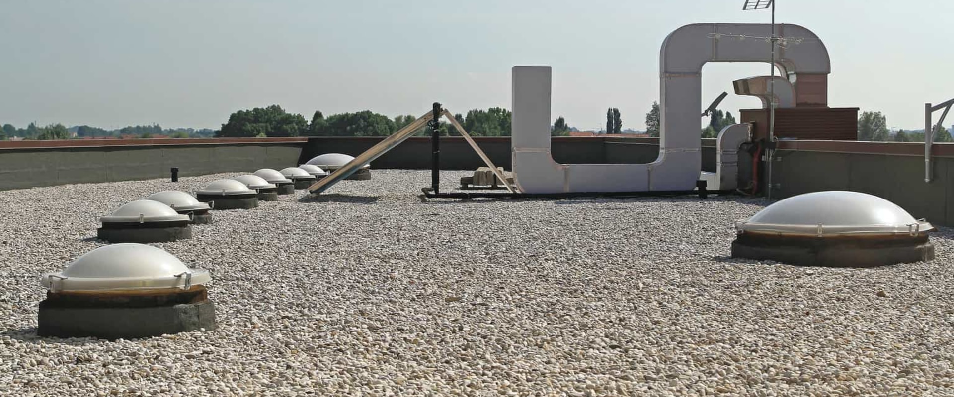 Why are industrial roofs flat?