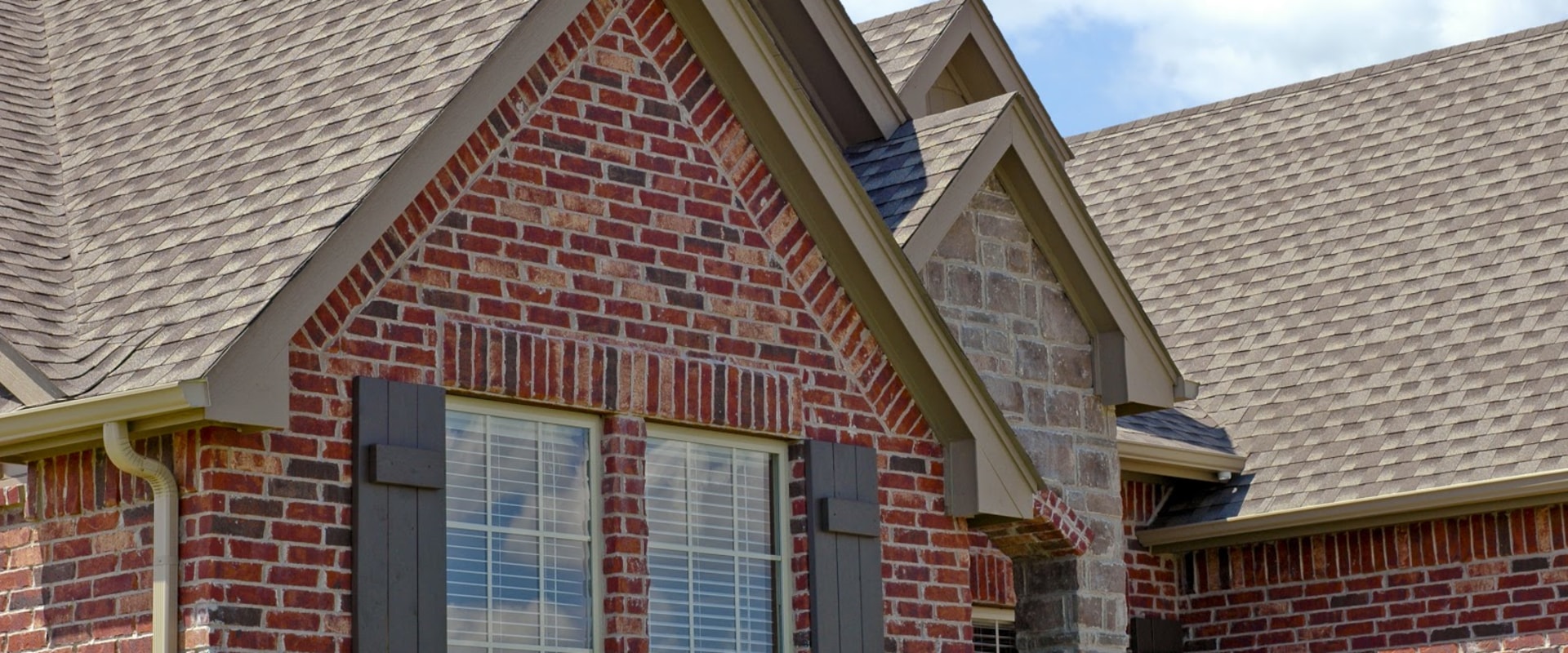 Why don't commercial buildings have slanted roofs?